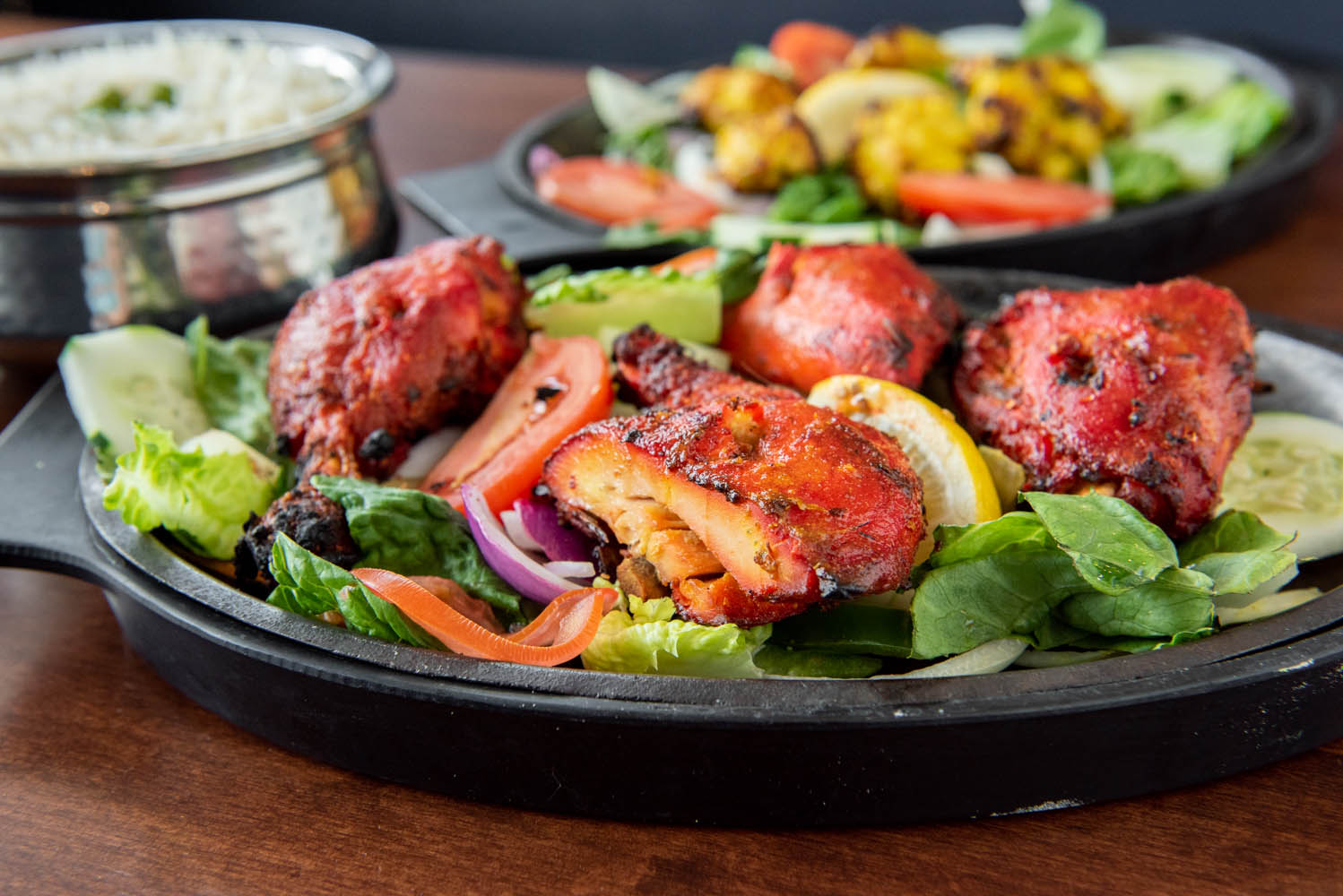 India Palace Indian Restaurant signature dishes Tandoori ChickenLamb Rogan JoshMalai Kofta